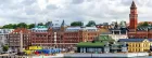 Colourful yellow, teal and brick buildings in the Swedish city of Helsingborg.