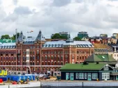 Colourful yellow, teal and brick buildings in the Swedish city of Helsingborg.