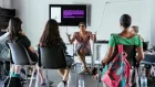 Half a dozen people seated in a circle at a Common Lab.